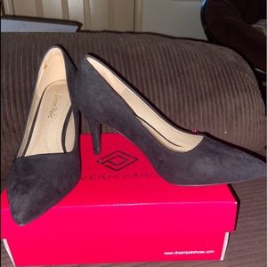 Black suede pumps